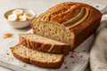 PAN DE PLÁTANO – 3 REBANADAS comme un cake bien doré de couleur marron